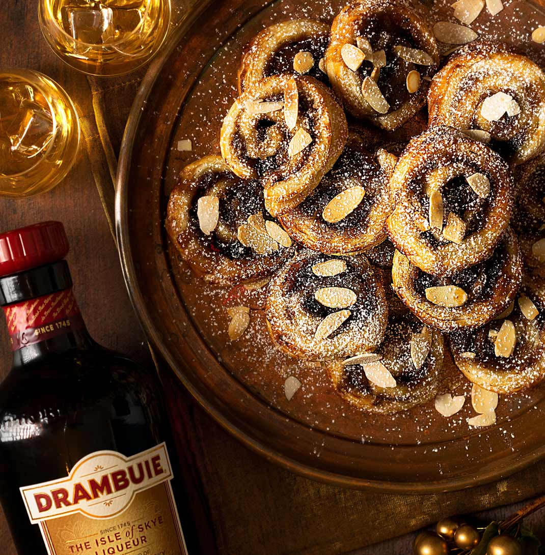 https://www.drambuie.com/assets/Uploads/cocktails/listimage/Drambuie-and-Cinnamon-Puff-Pastry-Swirls-desktop.jpg